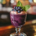 Fresh blueberry smoothie with a mint garnish for wp recipe